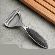 Stainless steel peeler and scraper